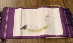 鶴の絵柄 紫色の布製アイテム