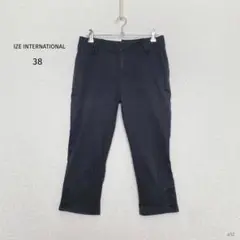 イゼ インターナショナル| クロップドパンツ 【38】ブラック 裾ボタンゆるカジ