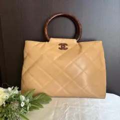 カゴバッグ　美品　ストロー素材　ウッドハンドル　シャネル　ヴィンテージ　6番台 カゴバッグ 美品 ストロー素材 ウッドハンドル シャネル