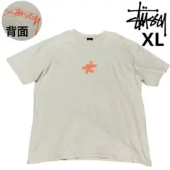 stussy ステューシー サーフマン ベージュ　Tシャツ 半袖　ロゴプリント