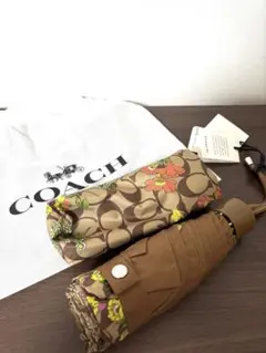 【新品未使用】COACH 花柄 折りたたみ傘 日本未発売！