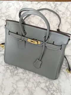 ブルーグレー レザー ハンドバッグ ゴールド金具ショルダー付き