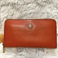 トリーバーチ オレンジ 財布 金属ロゴ ラウンドファスナー