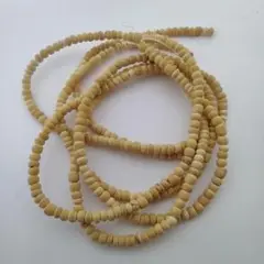 0343 ココナッツ ラウンデル（ベージュ） 3~4mm 3連