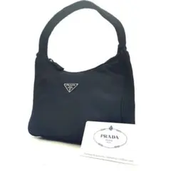 【極美品】PRADA アクセサリーポーチ 黒 ハンドバック 三角プレート 白タグ