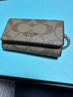 COACH シグネチャーケース ベージュ　ジャンク品