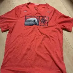 Nike オレンジ Tシャツ グラフィックプリント