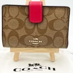 【袋つき】COACH ♣ 折り財布 ♣ シグネチャー ♣ ピンク