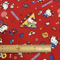 ハローキティ プリント生地 赤 音楽柄