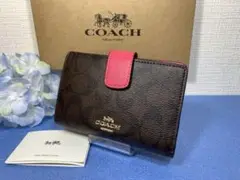 COACH コーチ シグネチャー 二つ折り ピンク