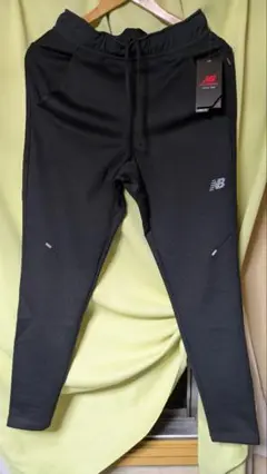 ニューバランス Q SPEED ストレッチウーブンパンツ AMP93255BK