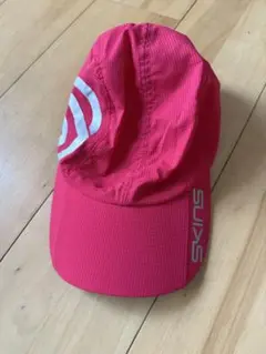 SKINS ピンク ランニングキャップ