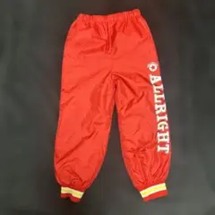 キッズ　赤色 ALLRIGHT プリント 長ズボン　シャカシャカ　100