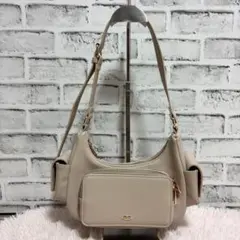 chico チコ ポケットデザイン ラウンドショルダーバッグ アイボリー