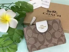 COACH コーチ 二つ折り財布 シグネチャー ブラウン × ホワイト