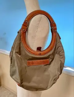 【Felisi】ナイロン×レザー サークルトートバッグ　（金具欠品）