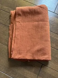 オレンジの綿生地 しわ加工　クレープ