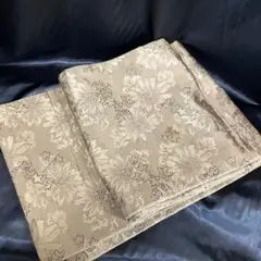 袋帯 正絹? 枯草色 花・桔梗 刺繍柄 両面全通