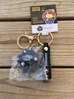 本日発売❕万博会場限定 なりきりサンリオ立体マスコットストラップ黒ポムポムプリン