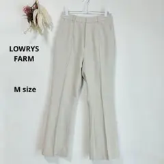 ローリーズファーム　スラックス　パンツ　M アイボリー　フレア　センタープレス