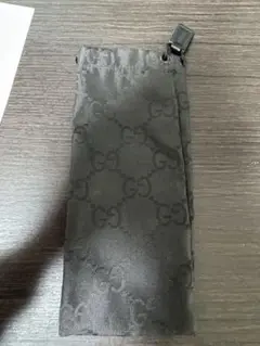 GUCCI 【未使用】巾着袋 サングラス用 GG柄 黒 美品
