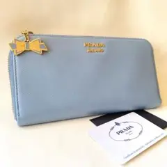 プラダ PRADA ラウンドジップ チャーム 長財布 リボン