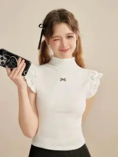 UNIFREE ホワイトフリル袖ノースリーブトップス