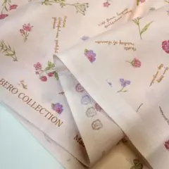ピンク　ムラ染めプリント　花　英字　ボタニカル　生地巾108cm×1m
