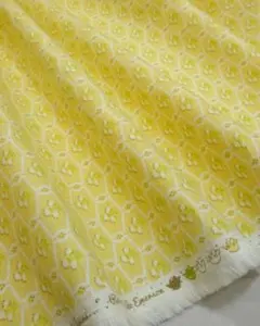 USAコットン　moda生地　ホワイトのラティスと小花　オレンジ