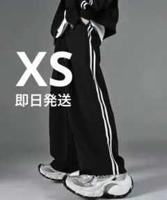 ADRER line track wide slacks ブラック