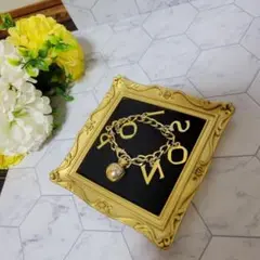 Dior ゴールド ロゴ チャーム ブレスレット