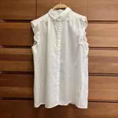 アースミュージック白ノースリーブシャツ