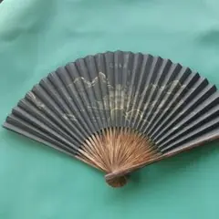 黒地金色山水画扇子