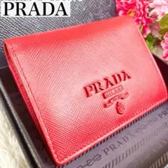 美品現行✨プラダ 二つ折り財布 シャイン ロゴプレート サフィアーノレザー 赤