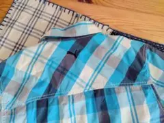 PUMAチェック半袖シャツSブルー水色