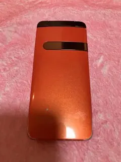 ジャンク品 CRATINA オレンジ折りたたみ式携帯電話本体 simなし 傷あり