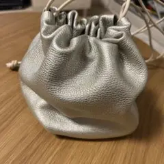 Inswirl シルバー ハンドバッグ
