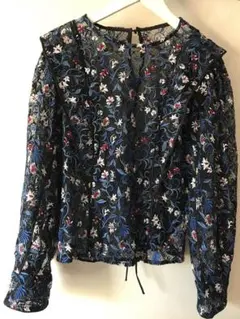 スナイル 花柄刺繍の総レースブラウス