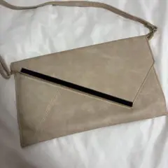 spice ベージュ クラッチバッグ