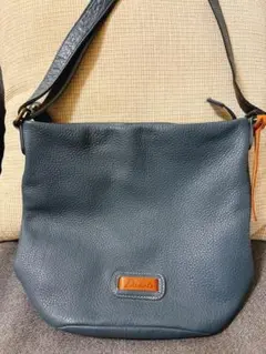 美品 ダコタ ショルダーバッグ バケツ型 型押しロゴ レザー シボ革 ネイビー