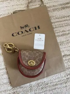 レア品•新品COACH ミニ サドル バッグ チャーム シグネチャー キャンバス