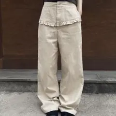 UNE MANSIONフロントフリルポイントローライズワイドシルエットパンツ