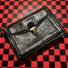 KIEFER ABROAD leather clutch bag