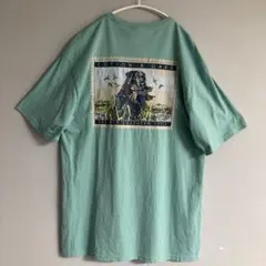 ブラックラブラドールの背面プリントTシャツ　胸ポケット　ターコイズ色　大きめ