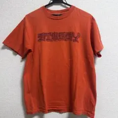Stussy オレンジ ロゴ Tシャツ