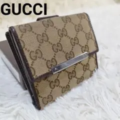 人気✨ GUCCI キャンバス×レザー 折り財布 シマ ロゴプレート ブラウン