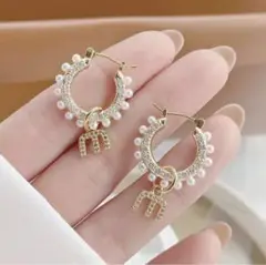フープ ゴールド mピアス ロゴ miumiu