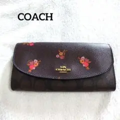 コーチ　長財布　フラワープリント　フラップ　シグネチャー　PVC　花柄　総柄