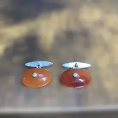 オレンジ樹脂の丸型カフリンクス