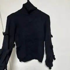 メリージェニー リボンニットハイネックトップス ブラック